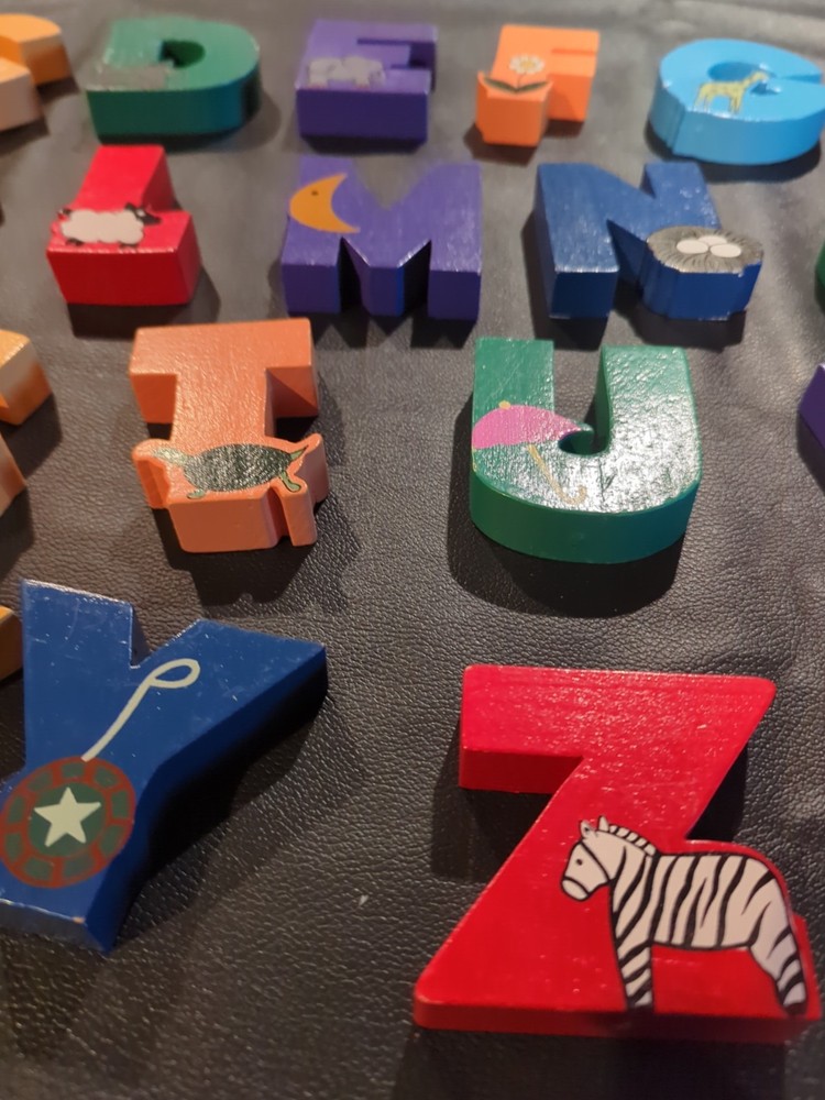 Solid wood alphabet letters in wood case