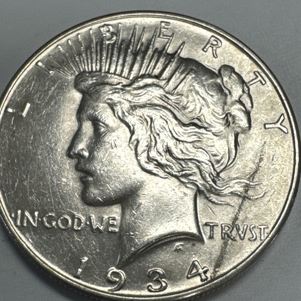 1934-D $1 Peace Silver Dollar AU.