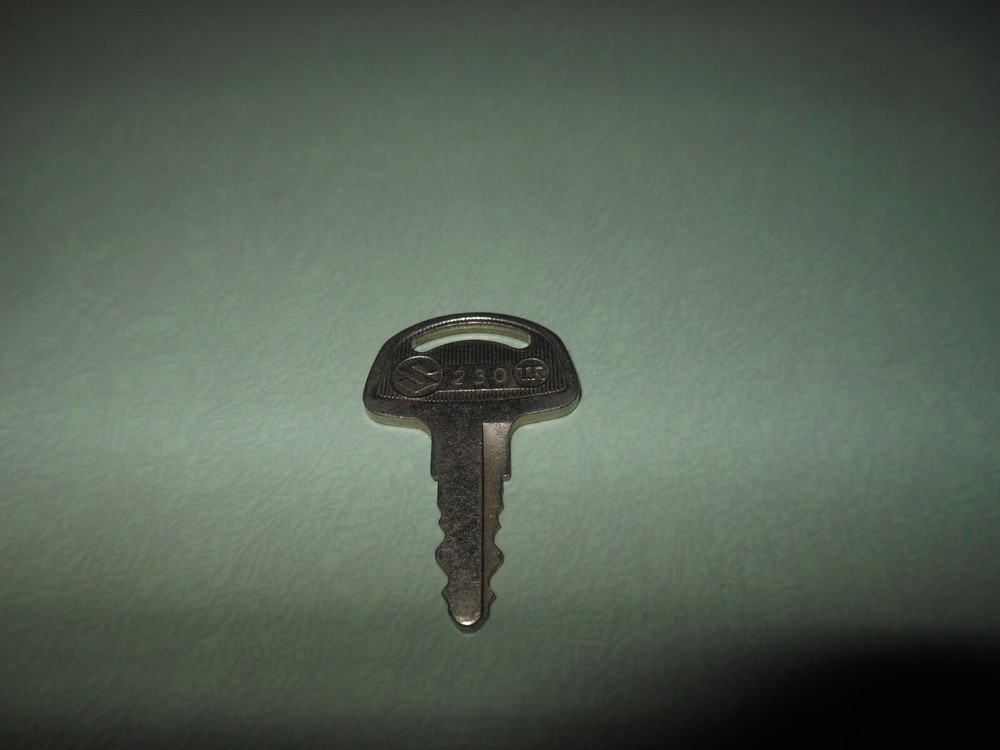 NOS OEM Suzuki Ignition Pre-Cut Key # 230