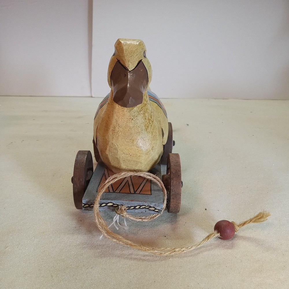 A bunny & duck on wheels pull toy