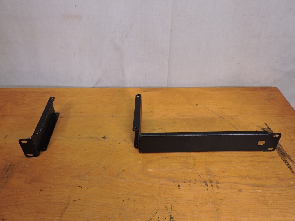 Shure half rack mixer/wireless mic rack mounting brackets.
