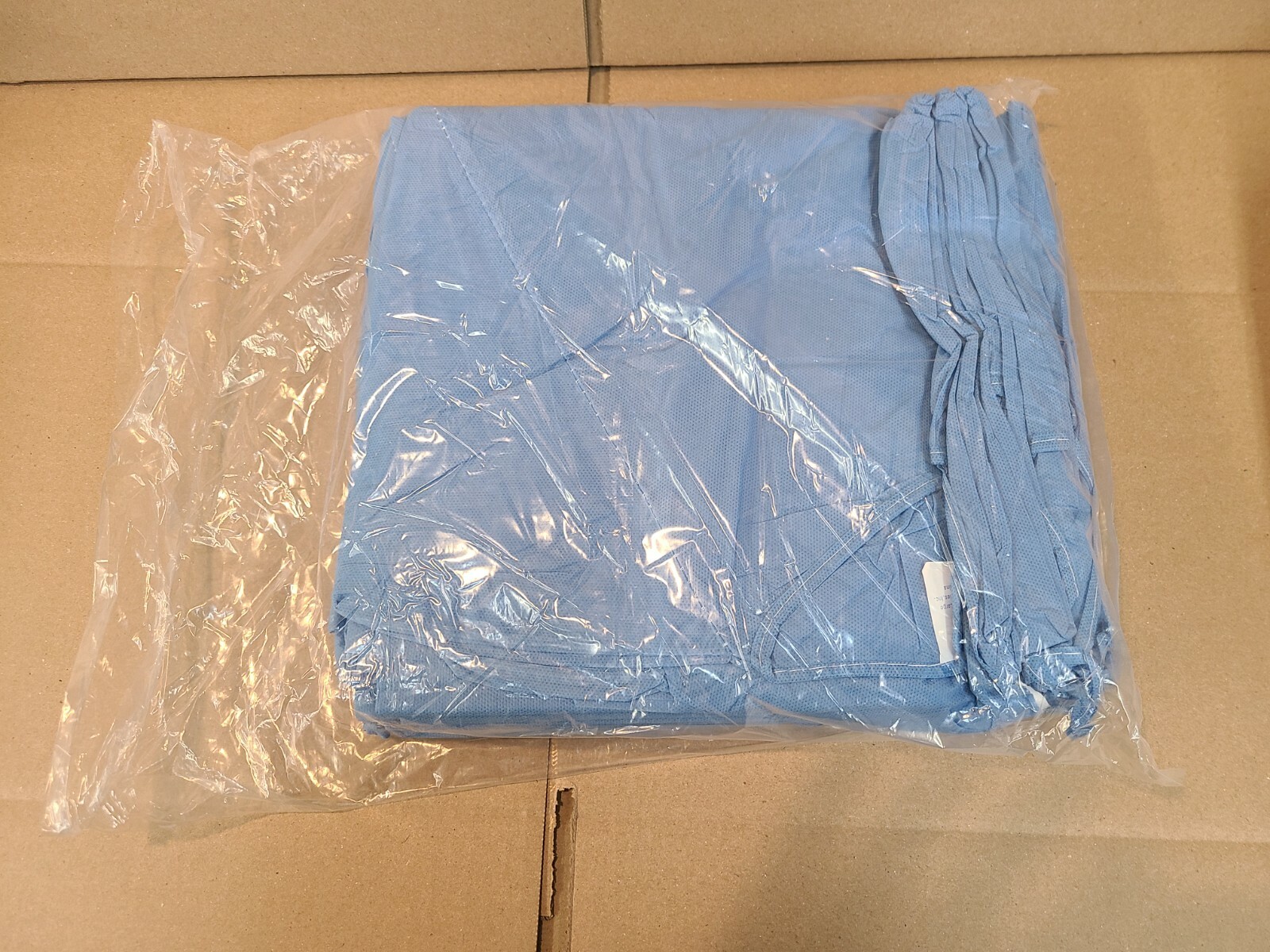 Case of 50 Medline Disposable Patient Gowns Multi-Layer Blue Short Sleeves Large