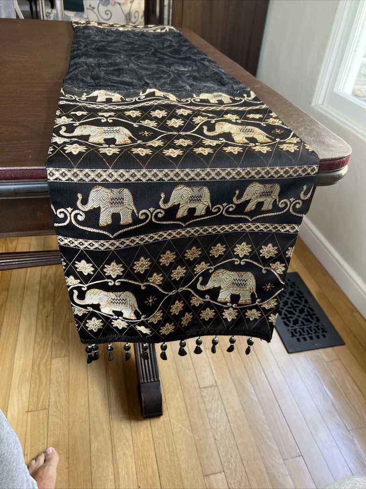 Table Runner With Gold Elephants On Black Backdrop