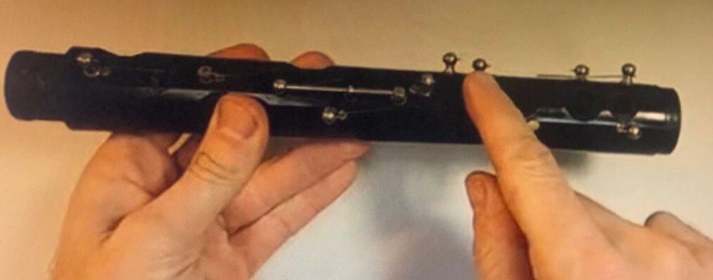 PARALLEL ACTION SPRING INSERTING PLIERS FEATURE FOR WOODWIND MUSIC INSTRUMENTS