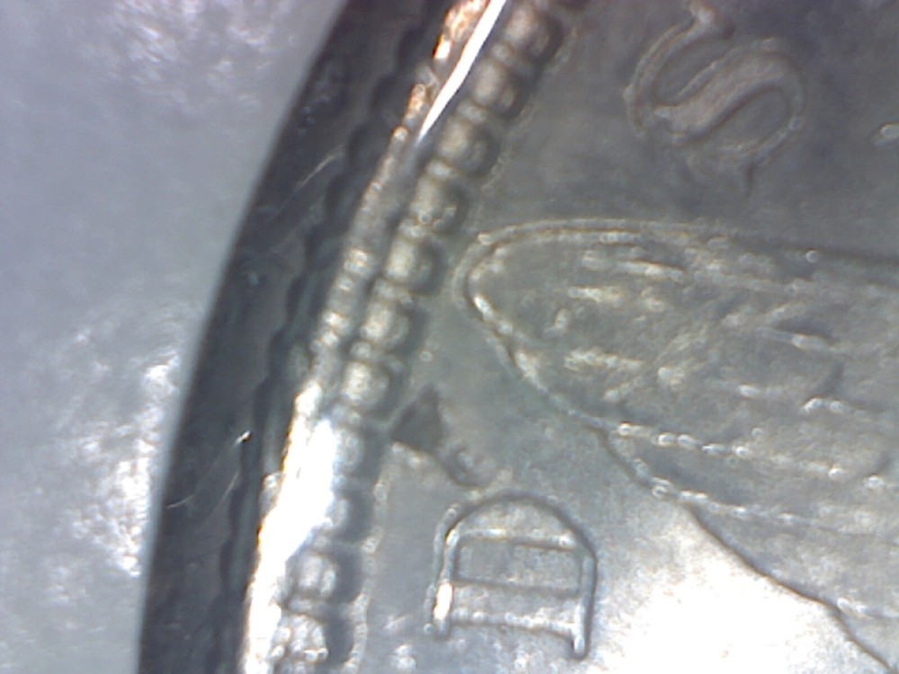 1880-S MORGAN DOLLAR BU TINY OBJECT IN PLANCHET ON REVERSE