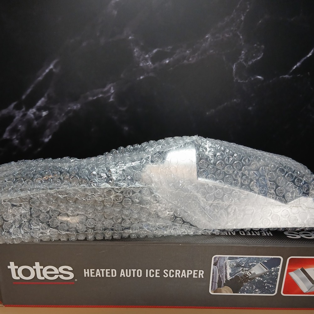 Totes Heated Auto Ice Scraper with a built-in flashlight.
