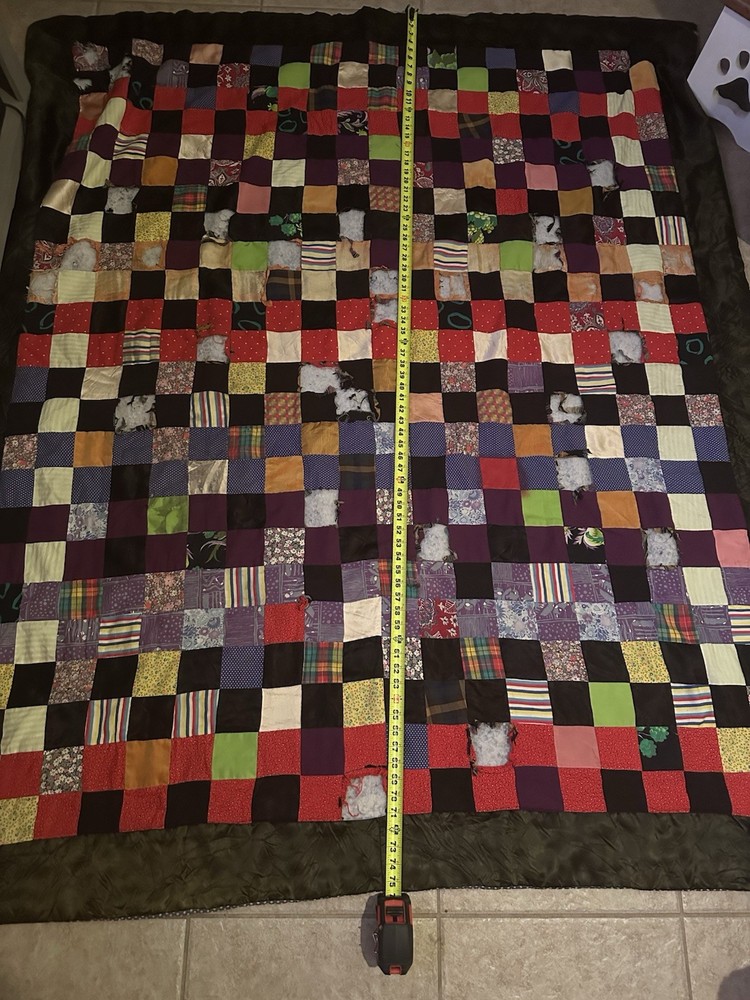 Cutters A handmade patchwork quilt with varied fabric squares