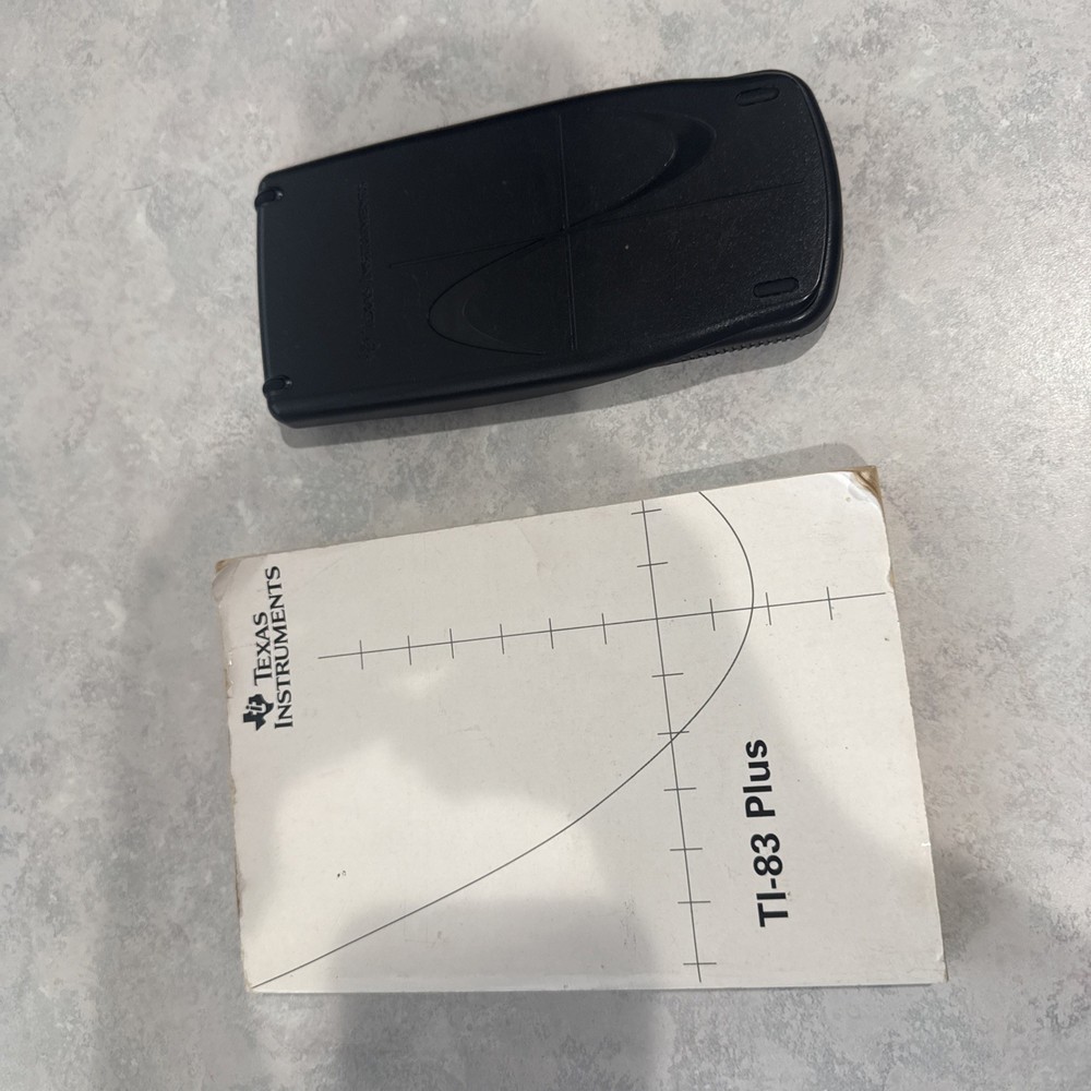Texas instruments TI-83 plus graphing calculator Used Working with Handbook