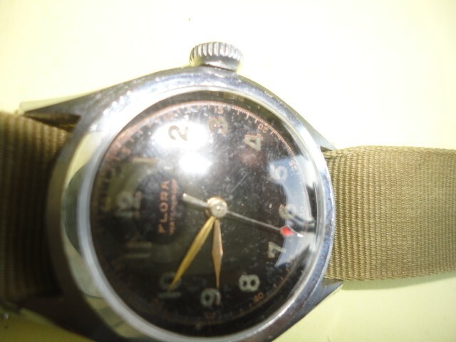 G.I. WRISTWATCH, RUNS WELL, FLORA BRAND