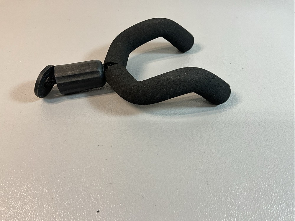 UNIVERSAL GUITAR WALL MOUNT, PADDED, NEVER USED. (R127).