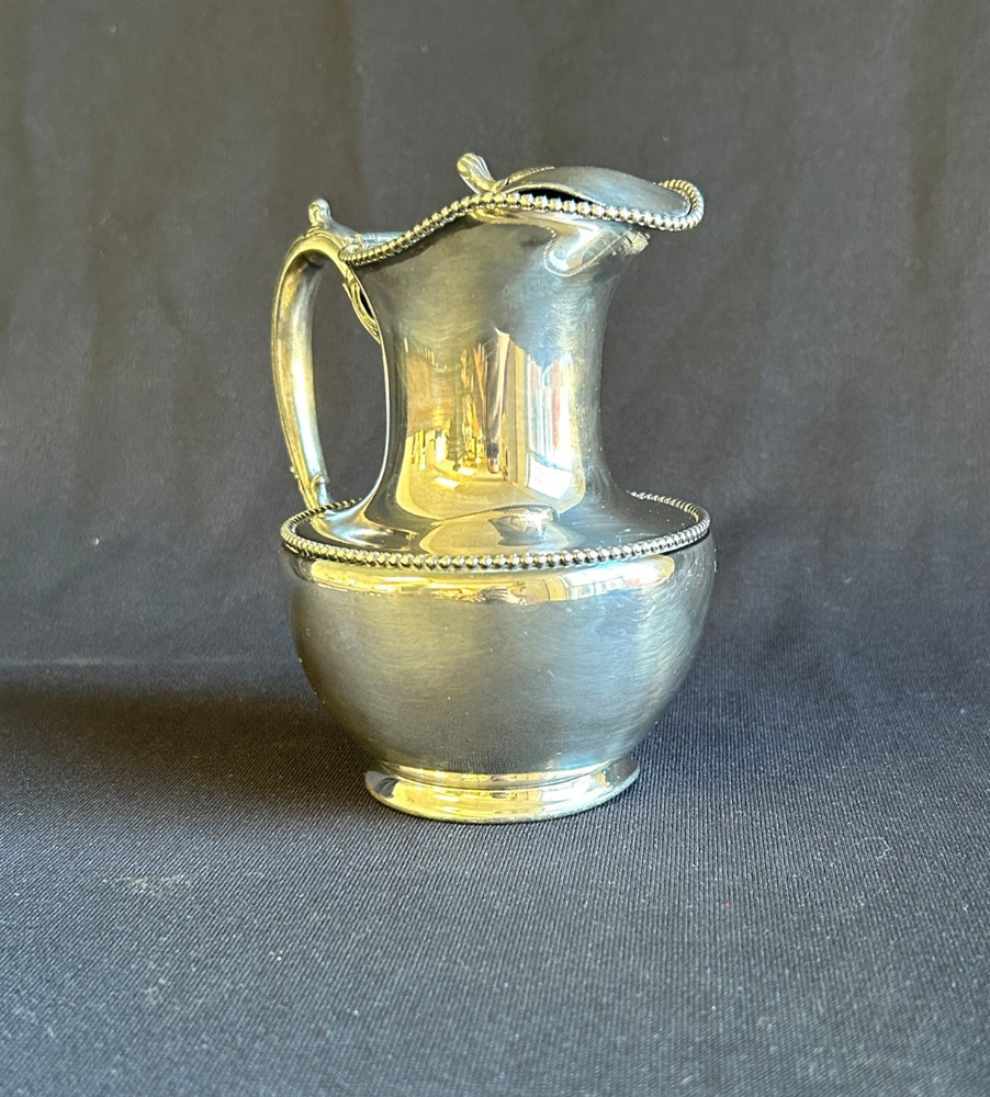 Superior Silver Co. Quadruple Plate Syrup Pitcher