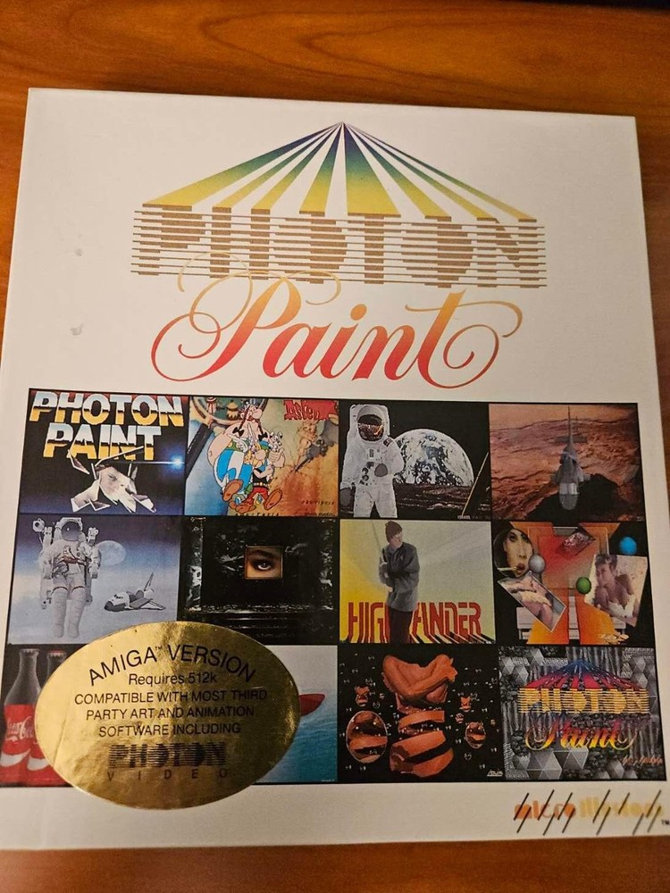 PHOTON PAINT by micro illusions for the Amiga Computer - 512K required.