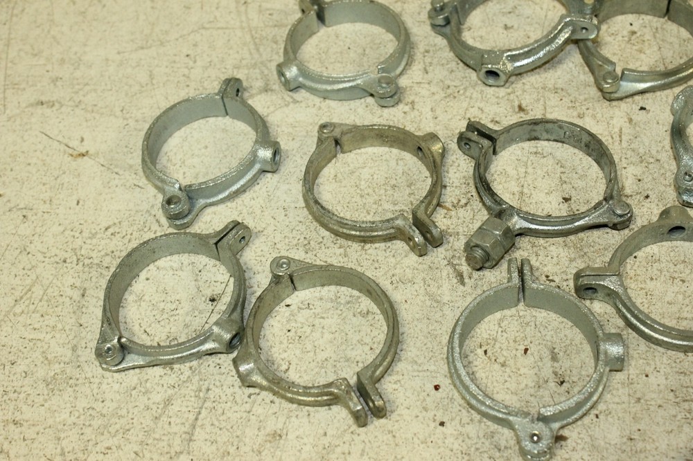 A lot of 2" Galvanized Split Ring Pipe Hangers