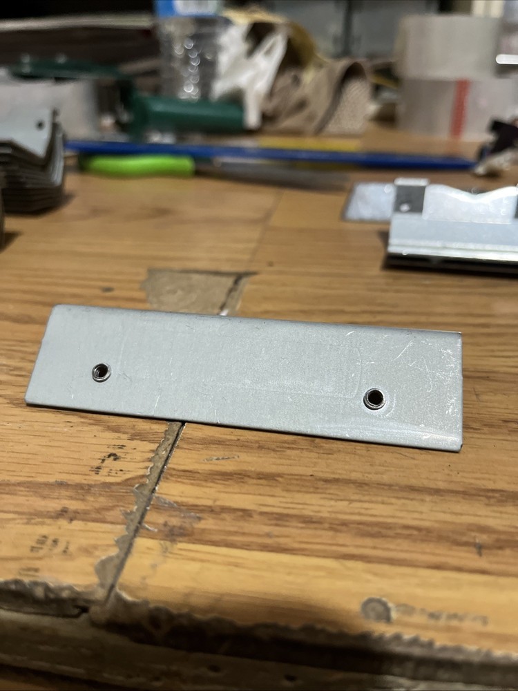 Igt coin in mounting bracket