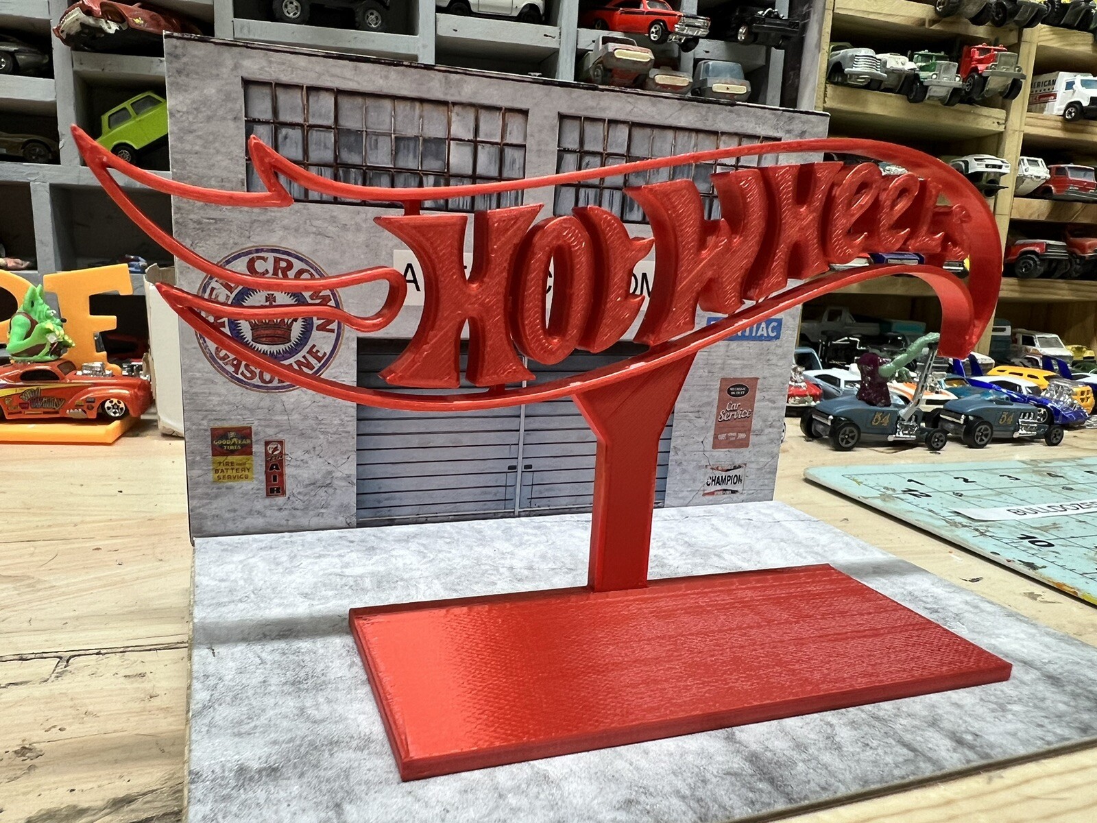 red hotwheels stand