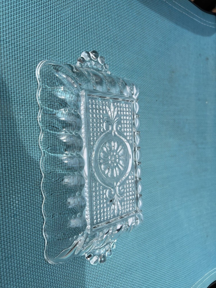 small rectangle shape crystal server with handles.  In good condition.