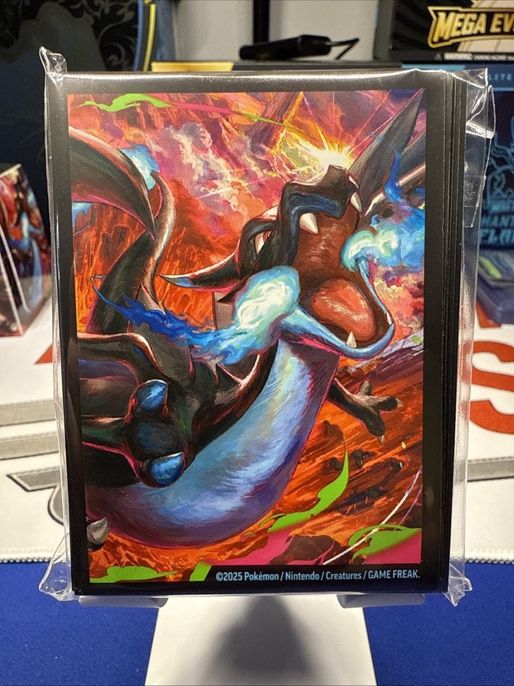Sealed Mega Charizard UPS Sleeves and Unplayed Dice