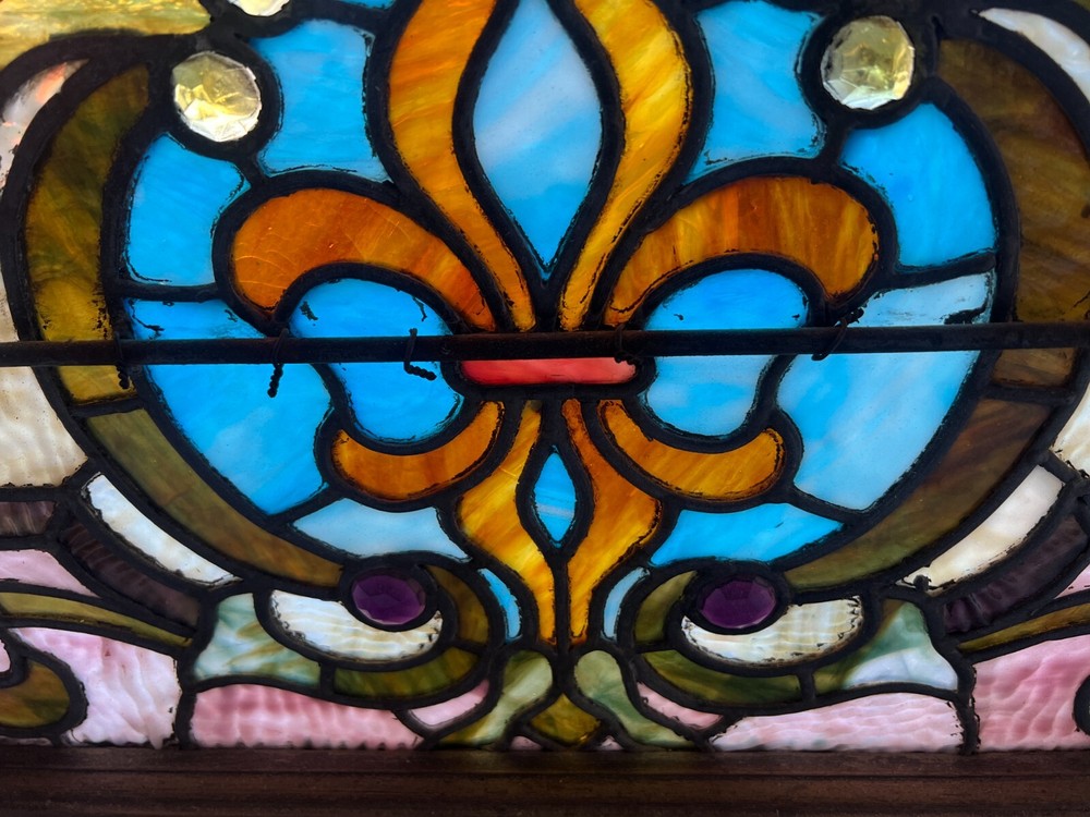Nice small jeweled stained glass window