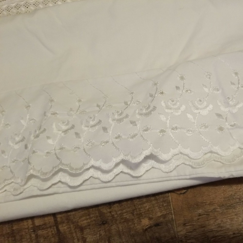2 White Pillowcases ( Do Not Match)