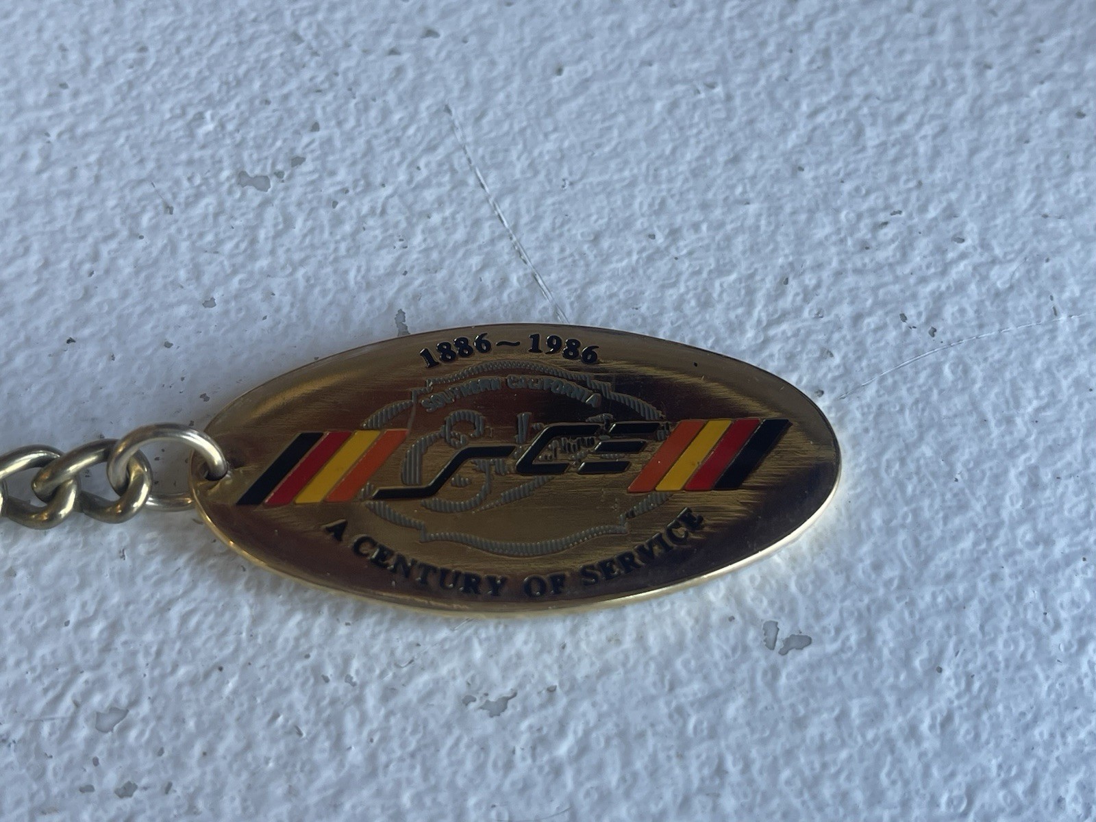 Southern California Edison Keychain Century of Service 1886-1986 Color Gold Tone