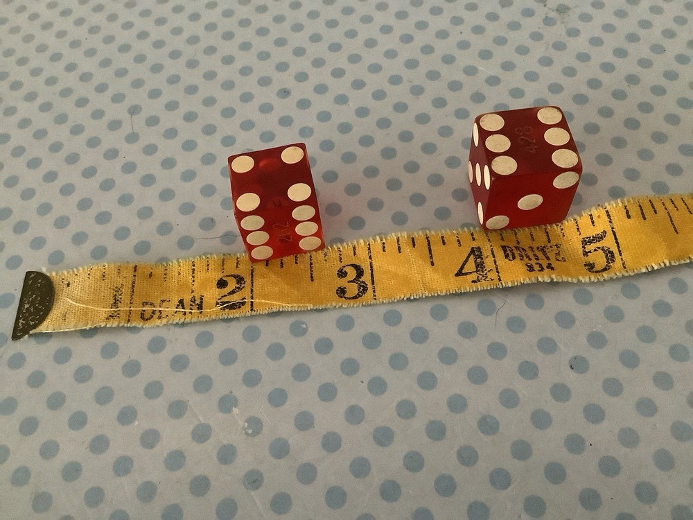 Vintage precision engraved dice, translucent red, sharp-edge, serial numbered