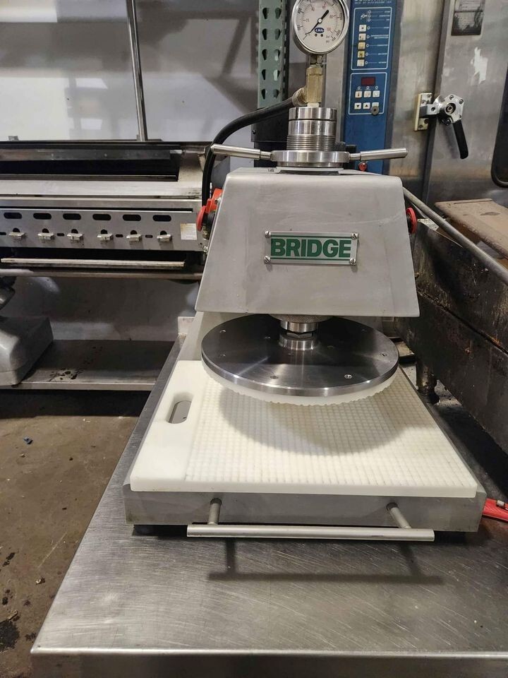 Pound-O-Matic Meat Flattener.