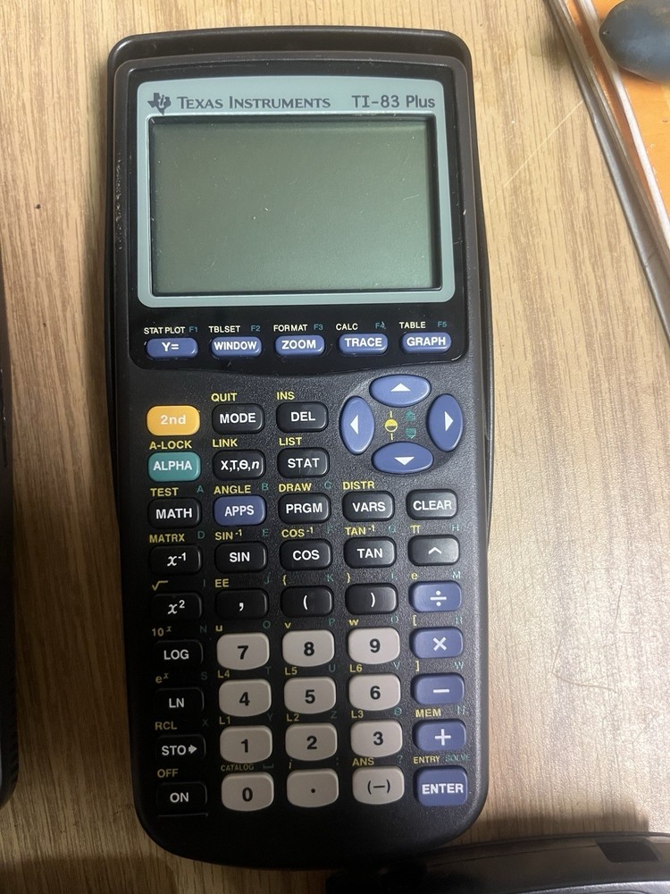 Texas Instruments TI-83 Handheld Graphing Calculator