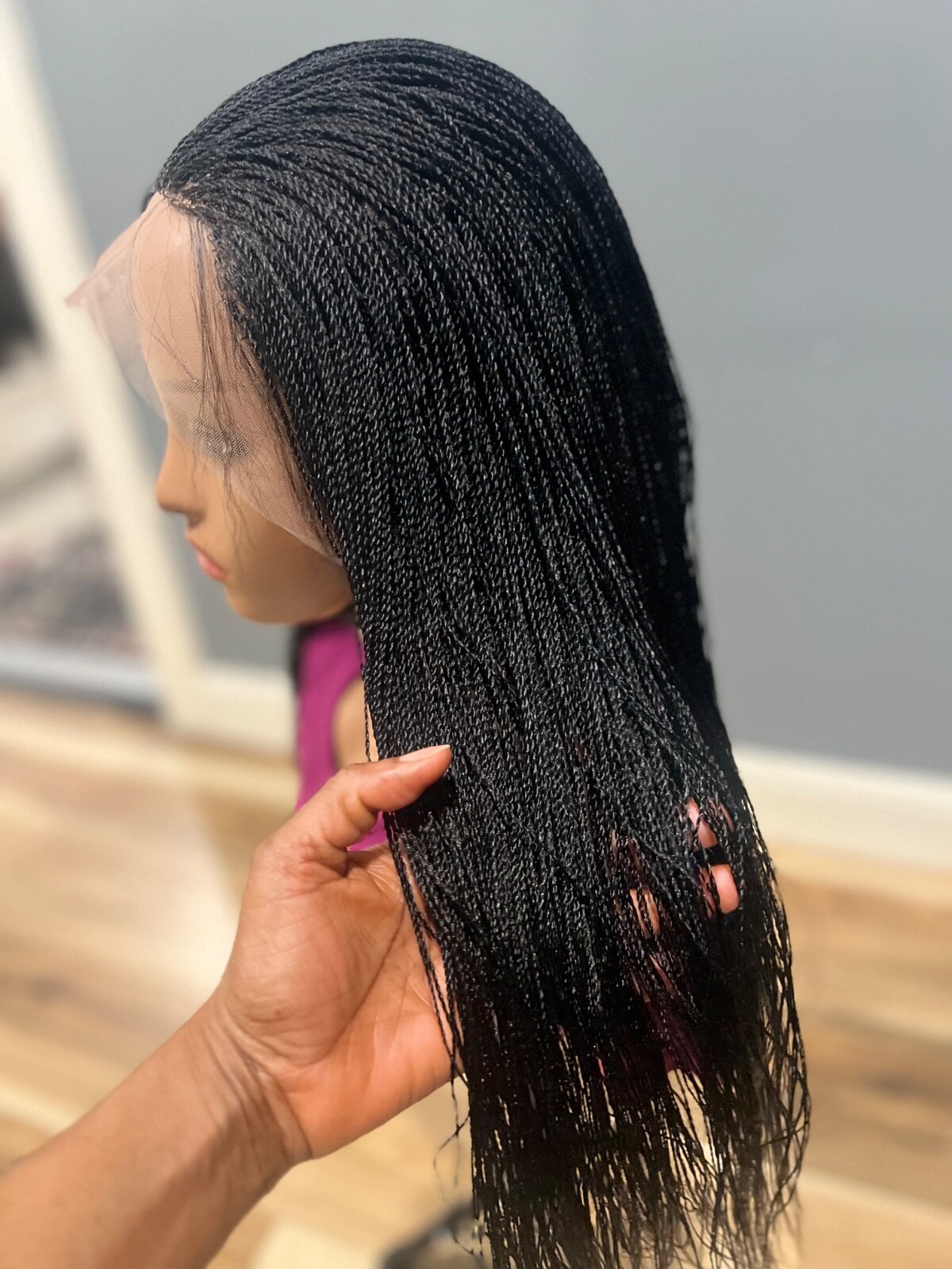 BRAIDED MICRO TWIST WIG . Madeon a full lace wig.length is 24”long..color black.