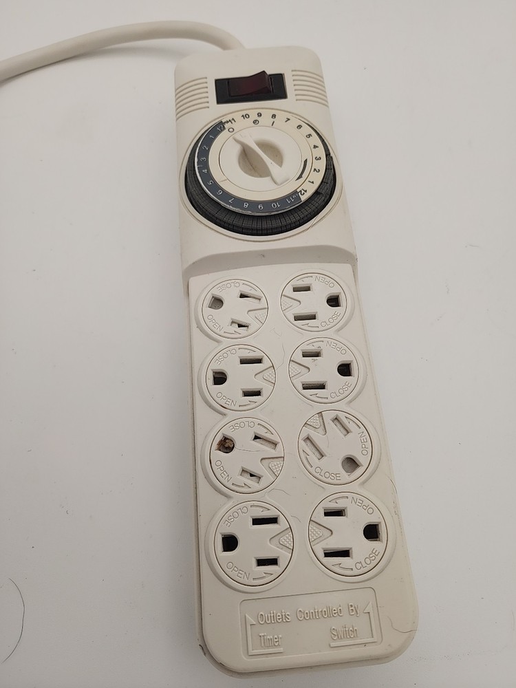 8 OUTLET PROTECTOR: SURGE TIMER + Reset Pre-owned