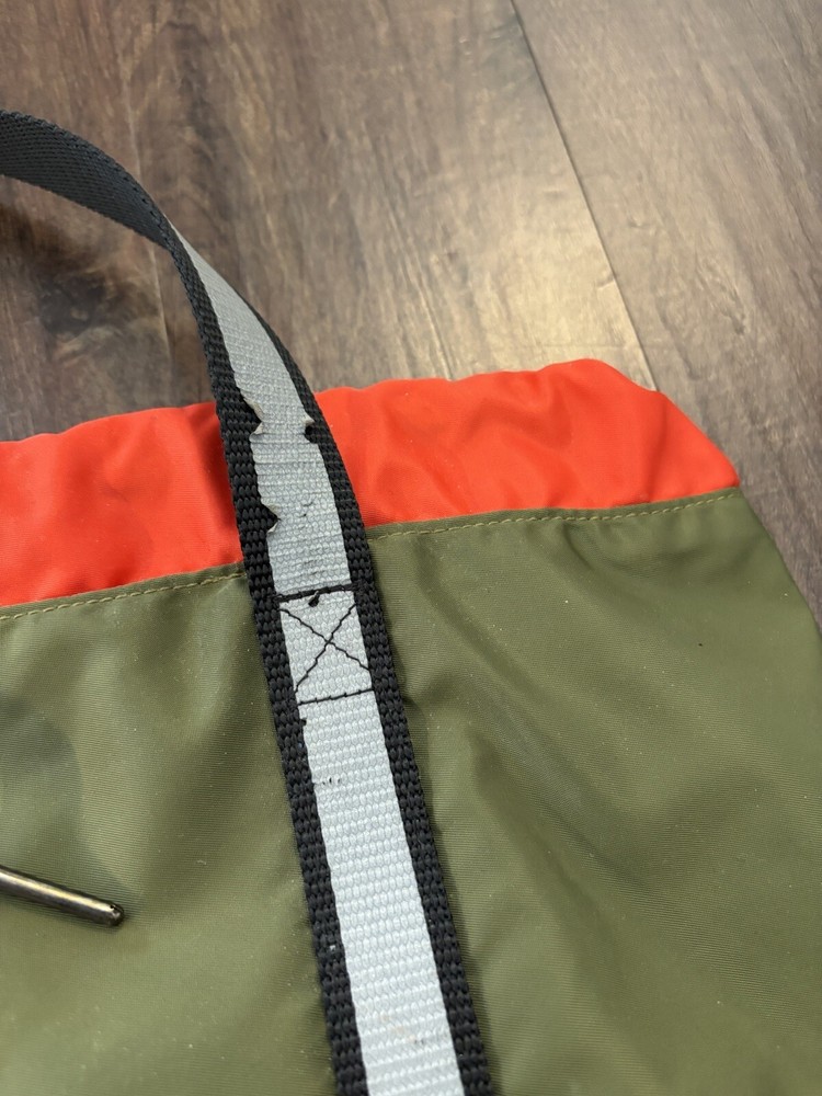 The ANDI Studio Backpack Drawstring Gym Bag Reflective Trim /Olive Green /Orange