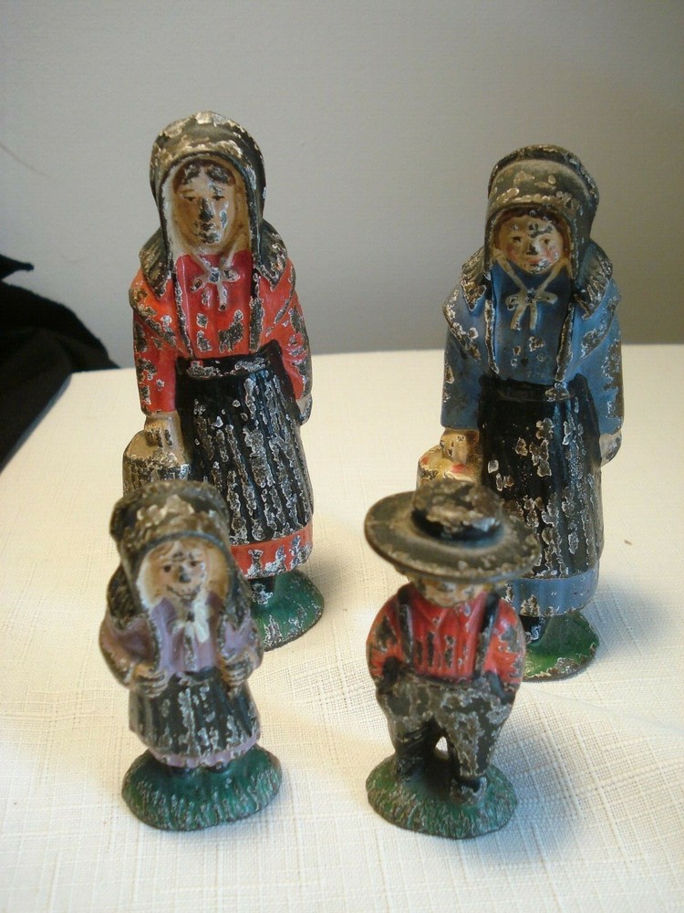 4-  Vintage  Cast Iron  Amish  Figurines