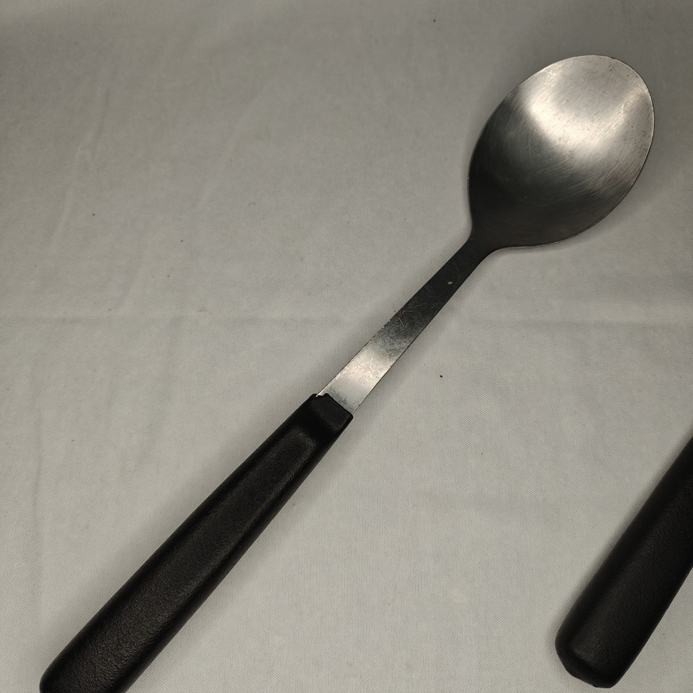 Vollrath 46952 12" Stainless Solid Spoon w/Plastic Coated Handle