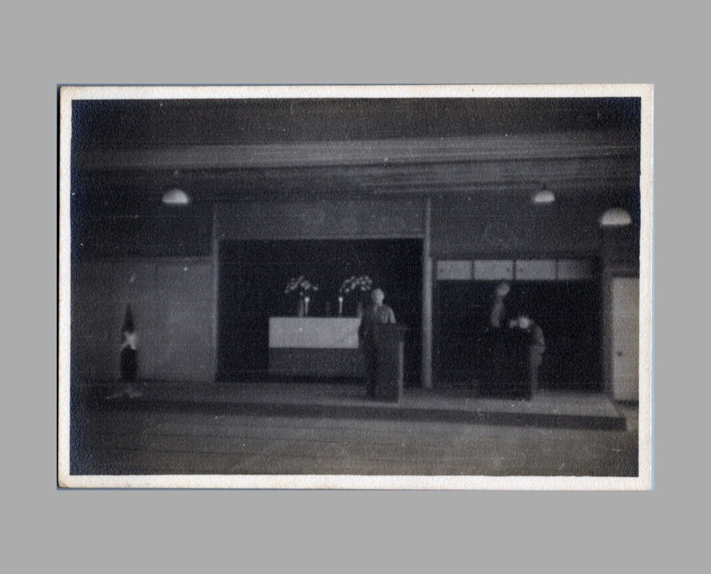 WW2 Era Photo Soldier Standing At Podium Inside Building