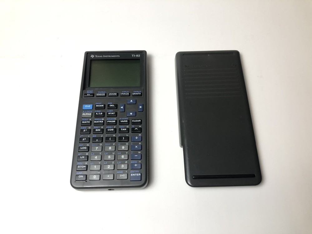 Texas Instruments TI-82 Graphing Calculator w/ Guidebook Manual