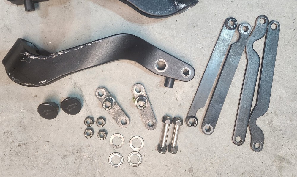 Quickie Pulse 6 Front, and Rear Wheel Mounting Brackets with Mounting Hardware