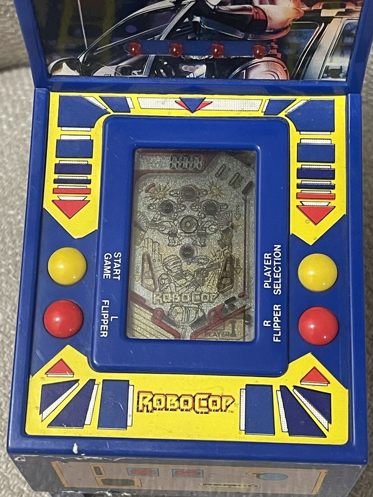 REMCO ROBOCOP ELECTRONIC HANDHELD PINBALL MACHINE- 1989