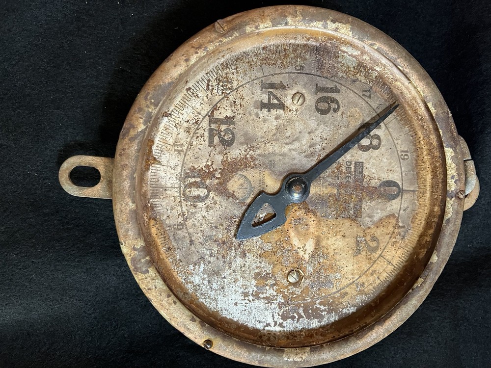 Antique rusty old hanging scale
