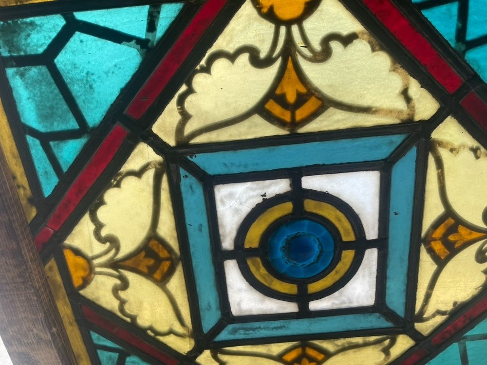 Small painted and fired stained glass window
