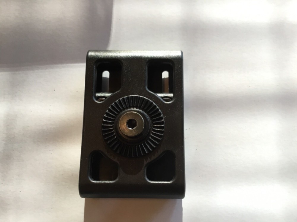 ITac paddle holster belt loop adapter.