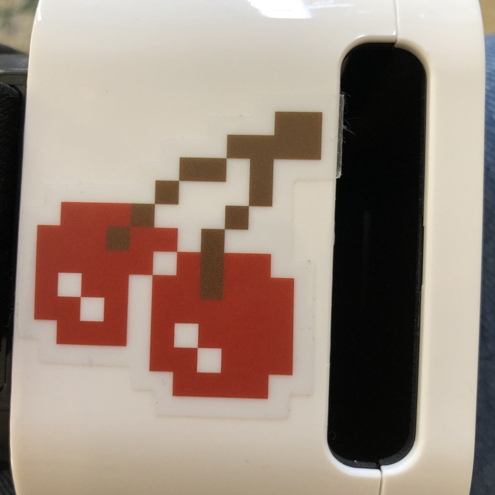 SHARPER IMAGE VR HEADSET WITH PAC MAN STICKERS