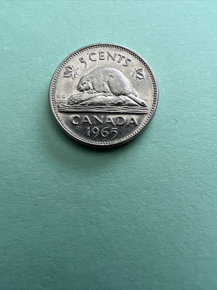1965 Canada 5 Cents coin circulate.