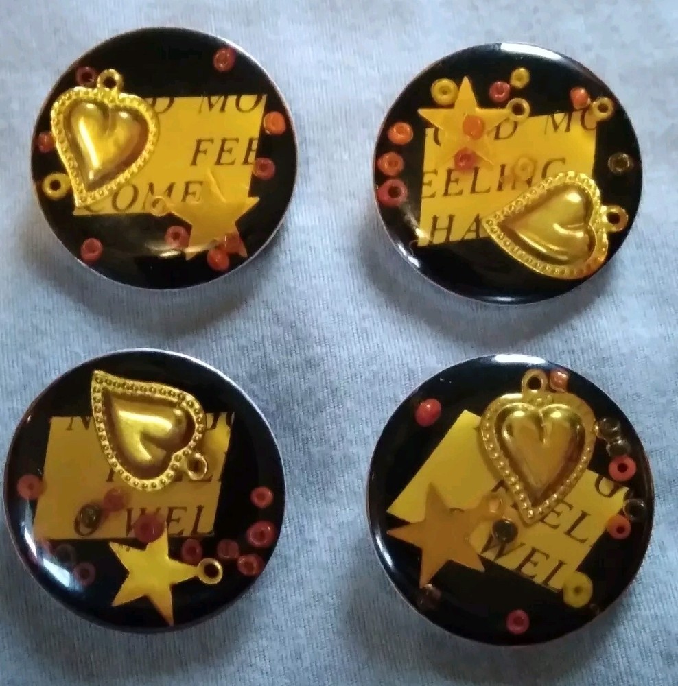 4 Vintage Junque Deco Plastic On Metal Buttons.