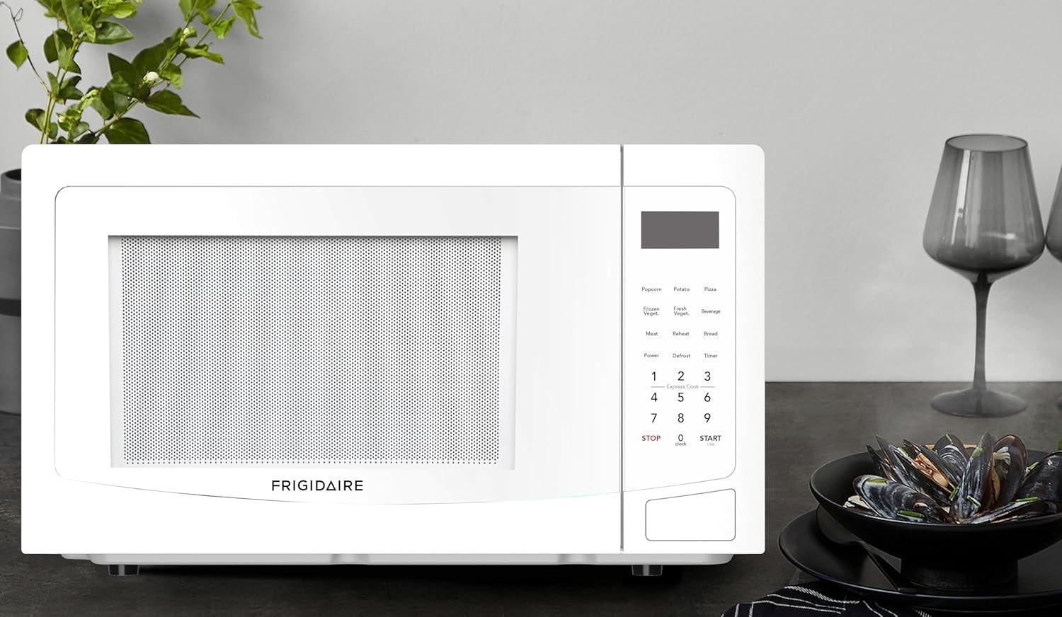 Frigidaire 1.1 Cu. Ft. 1000W Countertop Microwave (White)