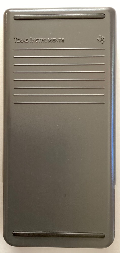 TI-82 Texas Instruments Graphing Calculator with package, case, manual and cable