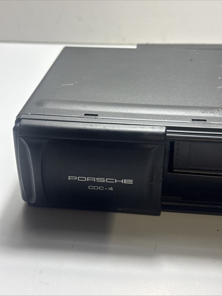 2003 - 2006 Porsche Cayenne CD Changer 6 Disc Player 7L5 035 111 A *NOTES