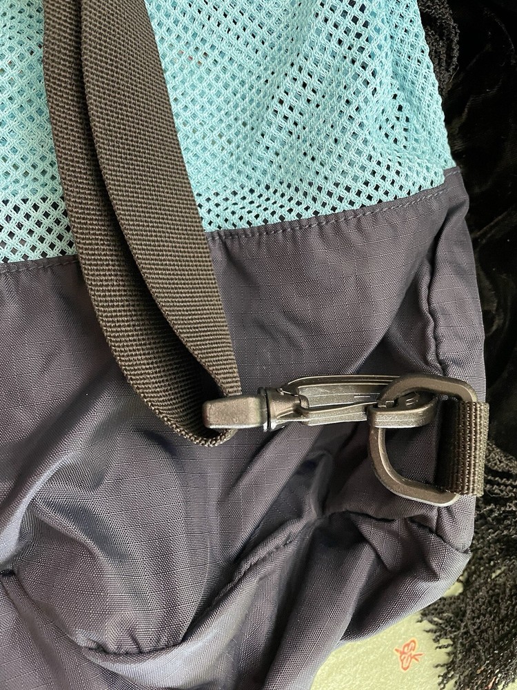 Eddie Bauer navy and teal drawstring bag with backpack straps