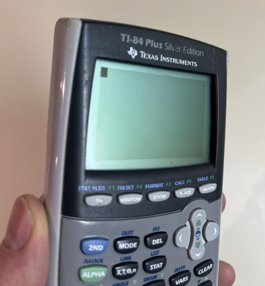Texas Instruments TI-84 Plus Silver Edition Graphing Calculator, Batteries Works