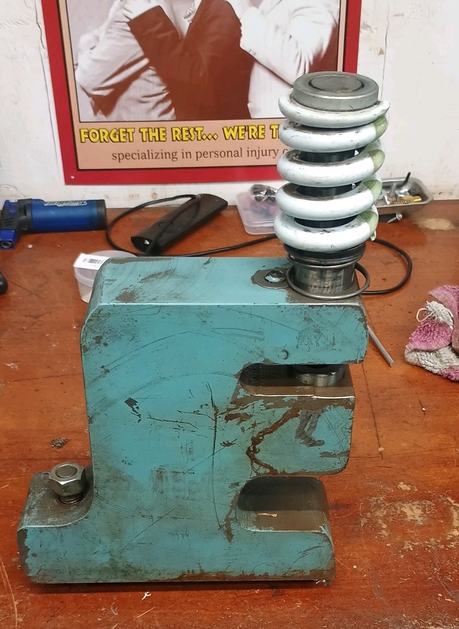 Unipunch style tool. 2 in wide. 12 in high. comes with 670 punch and 730 bottom