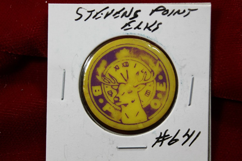 STEVENS POINT ELKS,  # 641 STEVENS POINT WISCONSIN, GOOD FOR TOKEN, yellow token