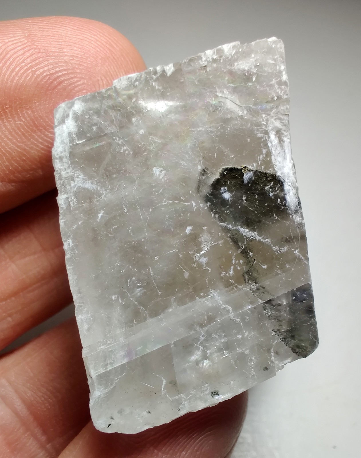 Calcite crystal with Pyrite crystals, fluorescent. Klein Quarry, Iowa. 45 grams.